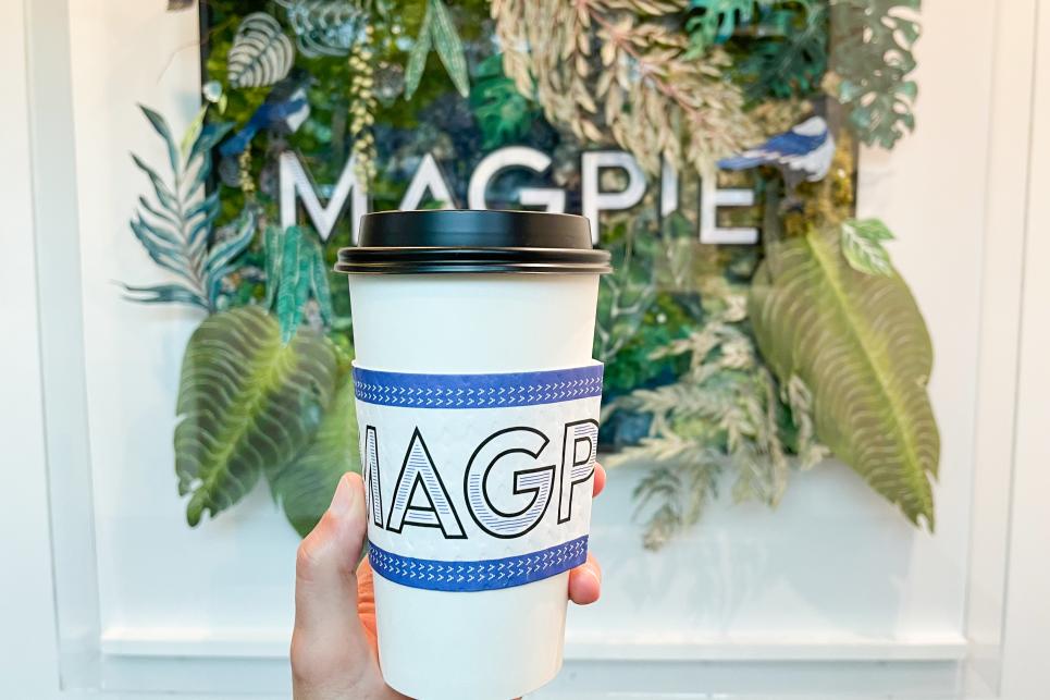 Magpie cup to go.