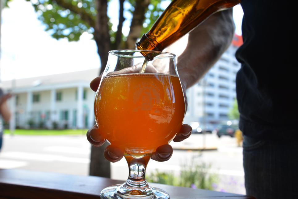 Pouring beer at The Bier Stein by Melanie Griffin