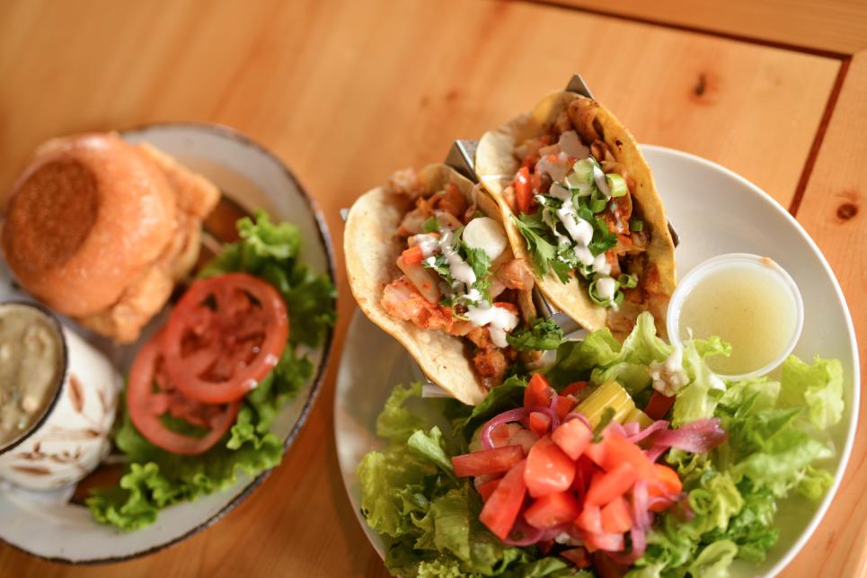 Fish tacos and a salmon burger with clam chowder.