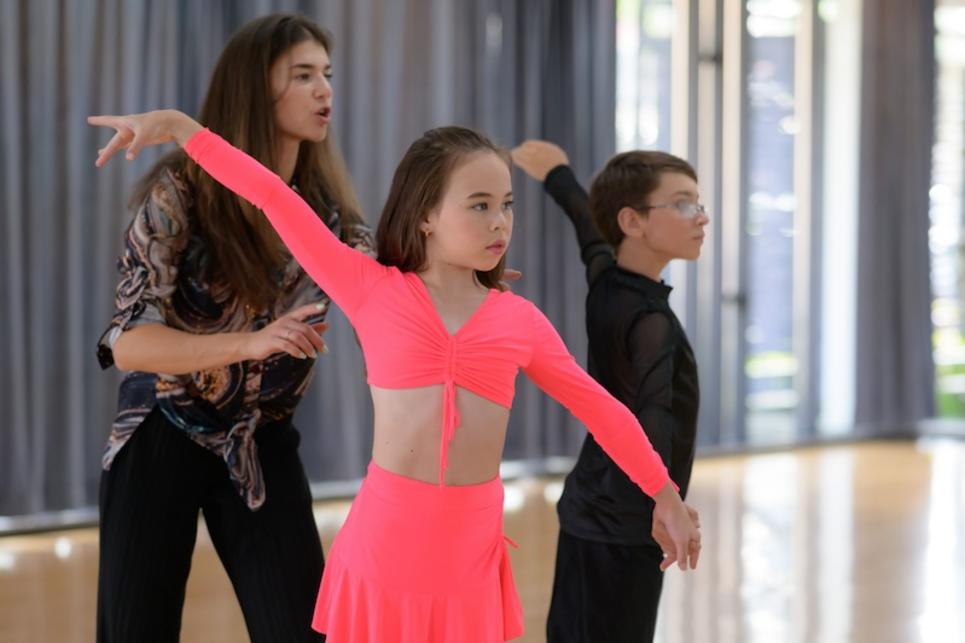 Kids in a ballroom dance class.