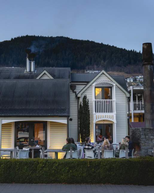 Outside shot of Botswana Butchery Restaurant historic building at dusk