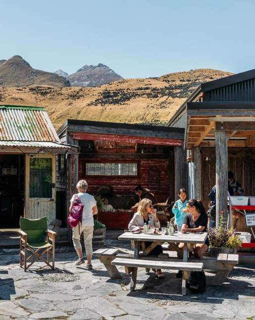 A group of people enjoying a beautiful day in Glenorchy at Mrs Wooly's General Store