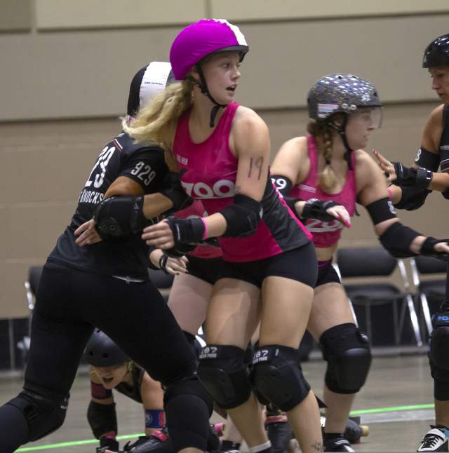 Players playing roller derby