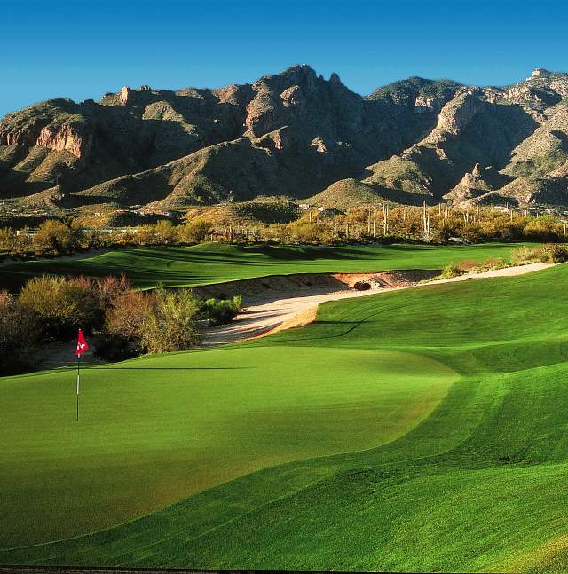 Green golf course at La Paloma with Mountain scenery in background