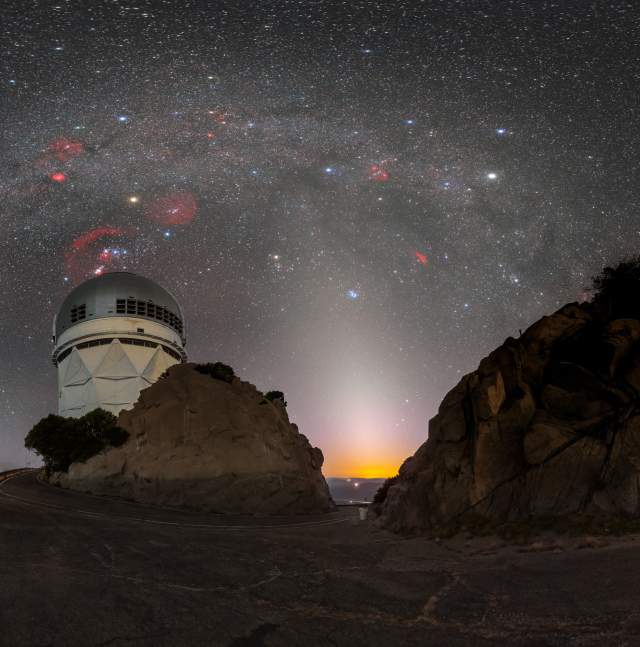 night sky full or stars and the milky way with the Nicholas U. Mayall 4-meter telescope at Kitt Peak National Observatory (KPNO)