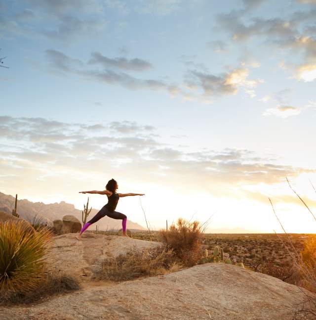 Woman doing yoga in the Sonoran Desert
