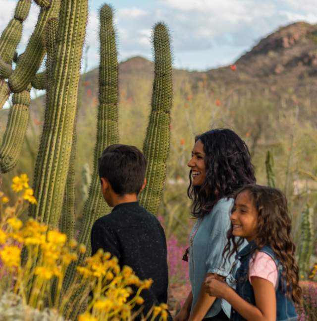 Family Enjoying Desert Flora