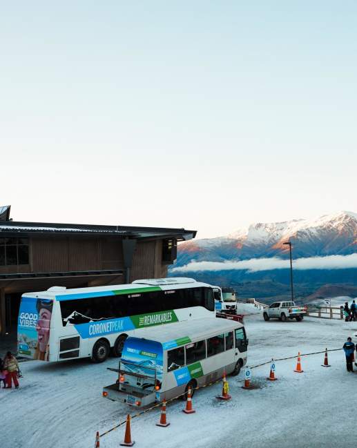 Ski field bus transporting passengers to the base building at Coronet Peak