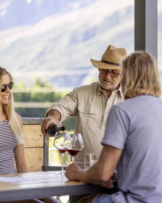 People enjoying a wine tasting in summer at Mt Rosa Wines