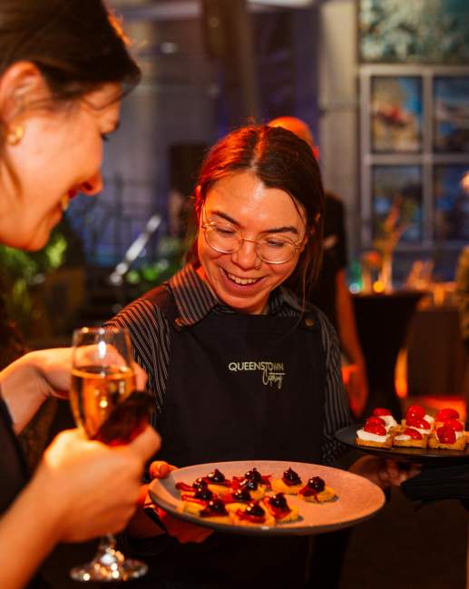 Catering serving canapes to guest