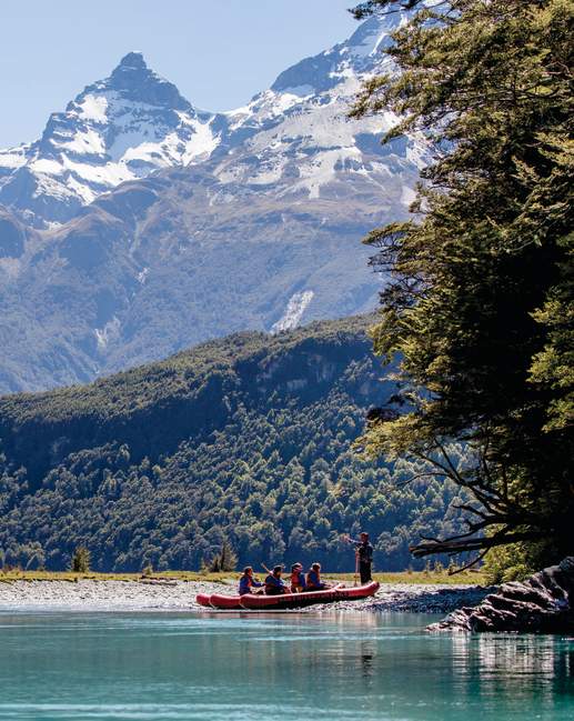 Group on Funyak tour with snow-capped mountains in the background