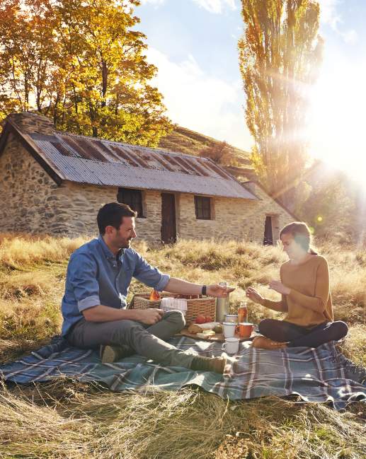 Picnic by historic cottage in Macetown Queenstown