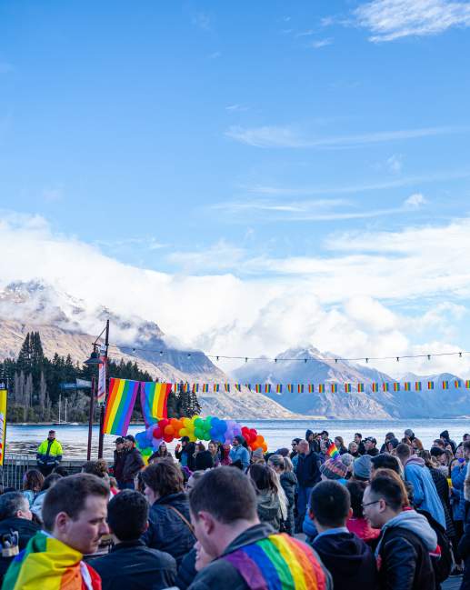 People celebrating Pride on Queenstown waterfront