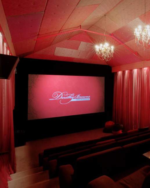 Inside Dorothy Browns Cinema with lush red interior and large comfortable seats, Arrowtown