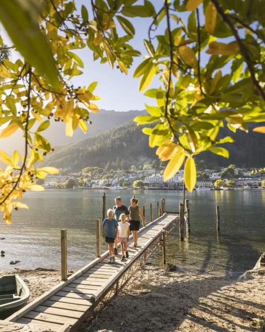 Family walking on pier