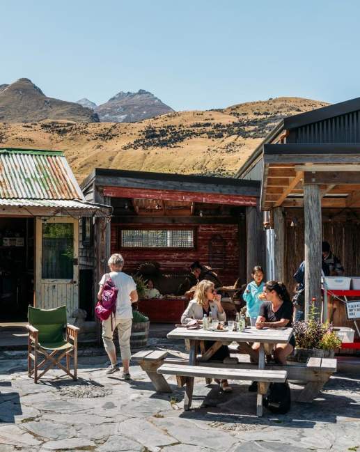A group of people enjoying a beautiful day in Glenorchy at Mrs Wooly's General Store