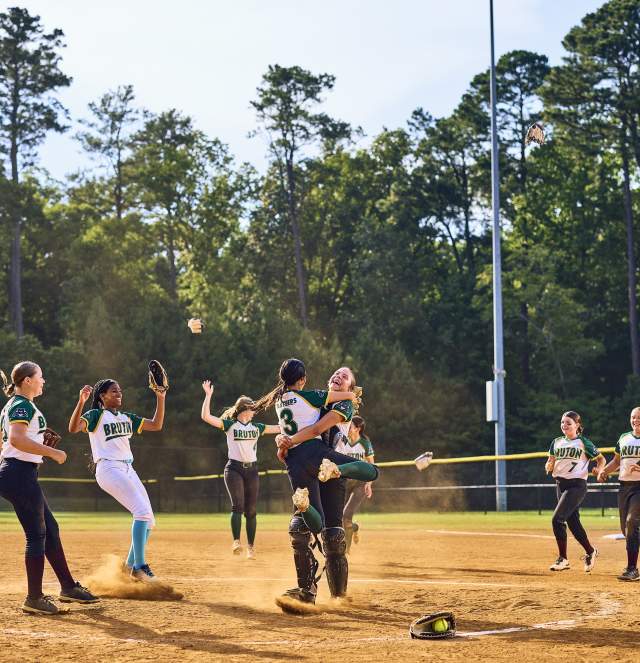 Group of Girls Celebrating a Softball Win