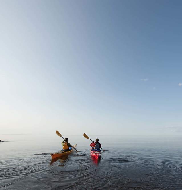 Two People Kayaking on Lake Supeior