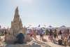 People browse sand castle creations at Texas Sandfest