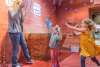 Family enjoying bubble cave in Customs House Museum, Clarksville, TN.