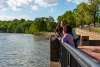 family at an overlook along the Riverwalk