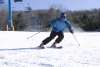 Man skiing down a slope in the Poconos