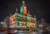 red and green lights cover a historic courthouse
