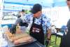 A man seasoning ribs.