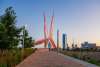 View of Skydance Bridge in Scissortail Park and the downtown skyline