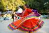 Woman dancing in red Folklorico dress