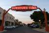 Downtown Yuma sign lit at twilight