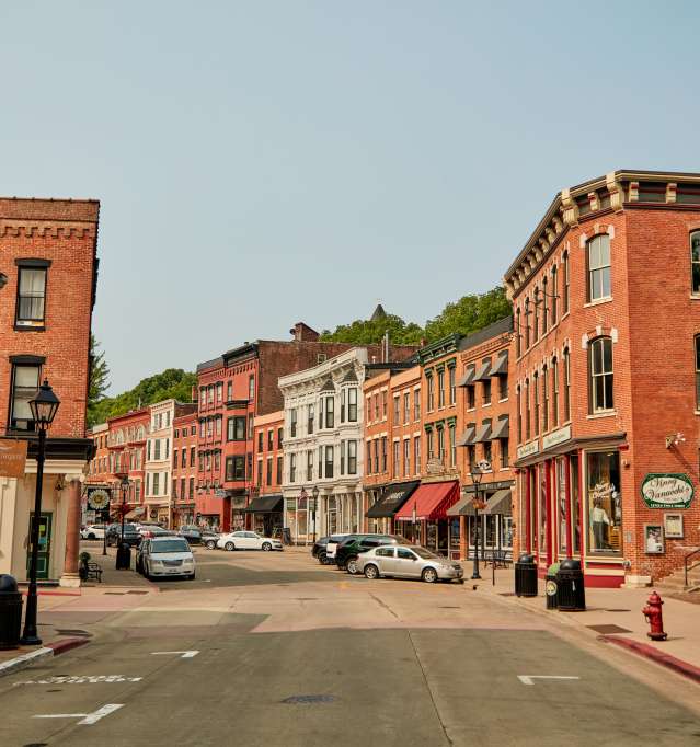 Picture of downtown Galena, Main Street, with brick buildings and cars parked along the street.
