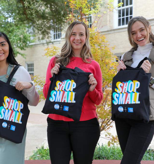 3 ladies with shop small totes