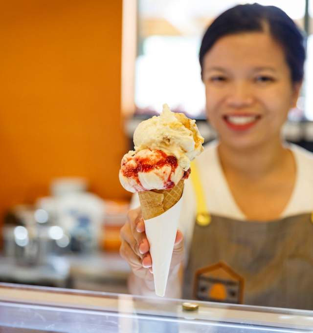 Lady serves ice cream at the House of Honey in the Swan Valley