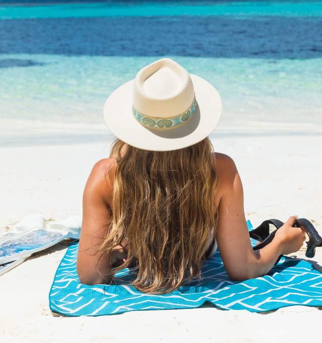 Girl on beach overlooking the ocean on Rottnest Island