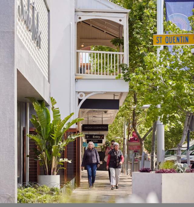 People walking through the Claremont Town Centre
