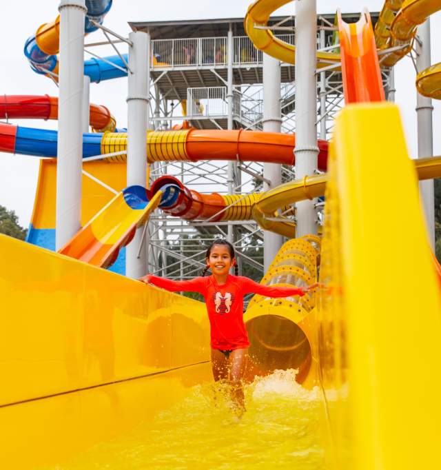 Kids on the waterslides at Perth's Outback Splash in the Swan Valley