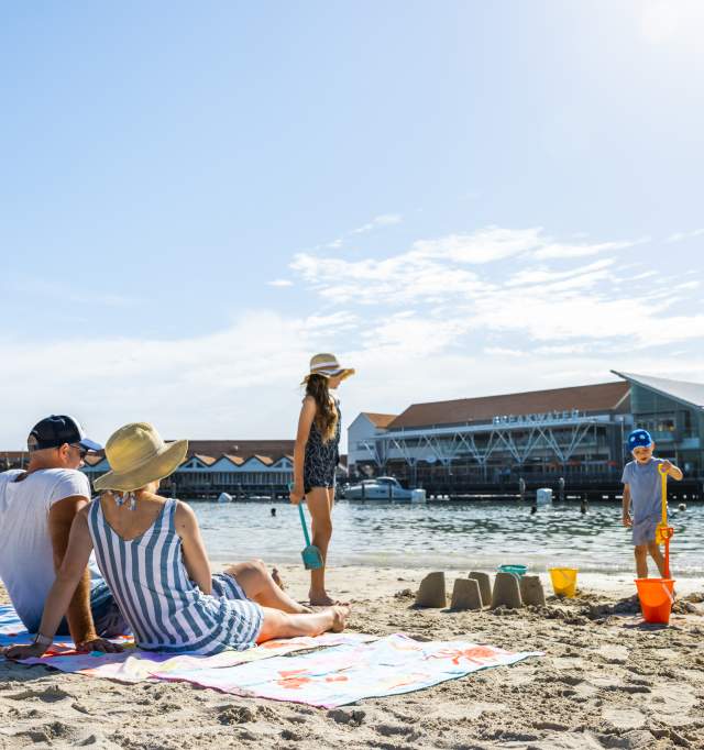 Family at beach at Hillarys Boat Harbour, Sunset Coast