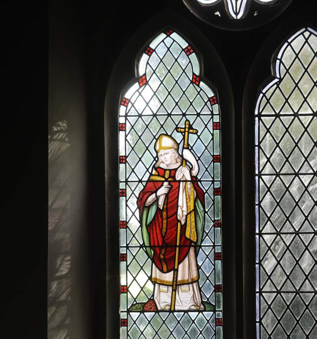 A stained glass window of Stephen Langton in a church