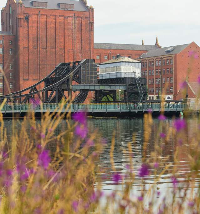 Grimsby docks river with industrial buildings in background