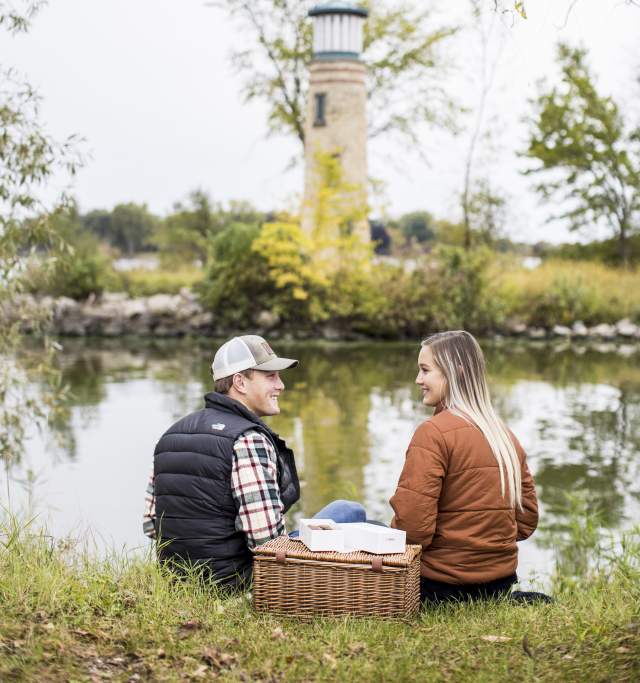 Couple Has A Picnic At Asylum Point Park And Lighthouse In Oshkosh