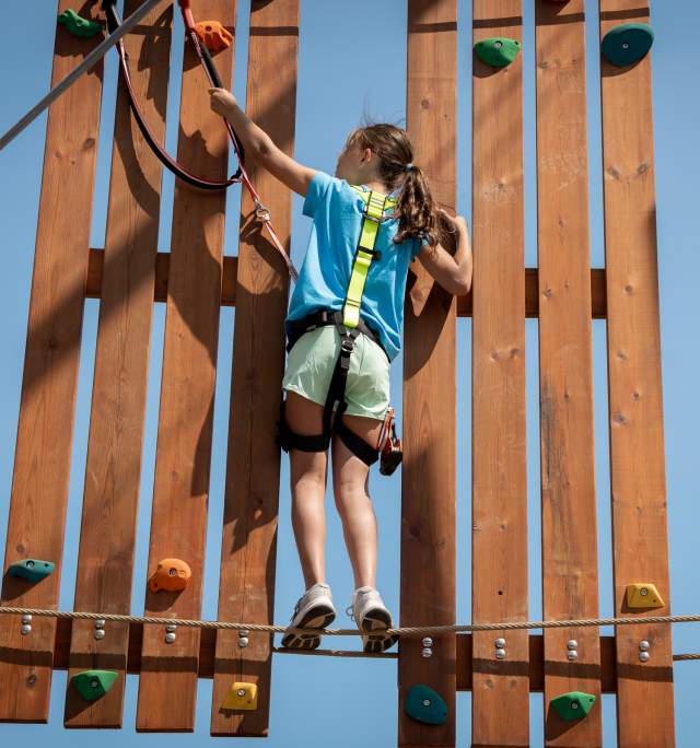 A young climber at Hangdog Outdoor Adventure