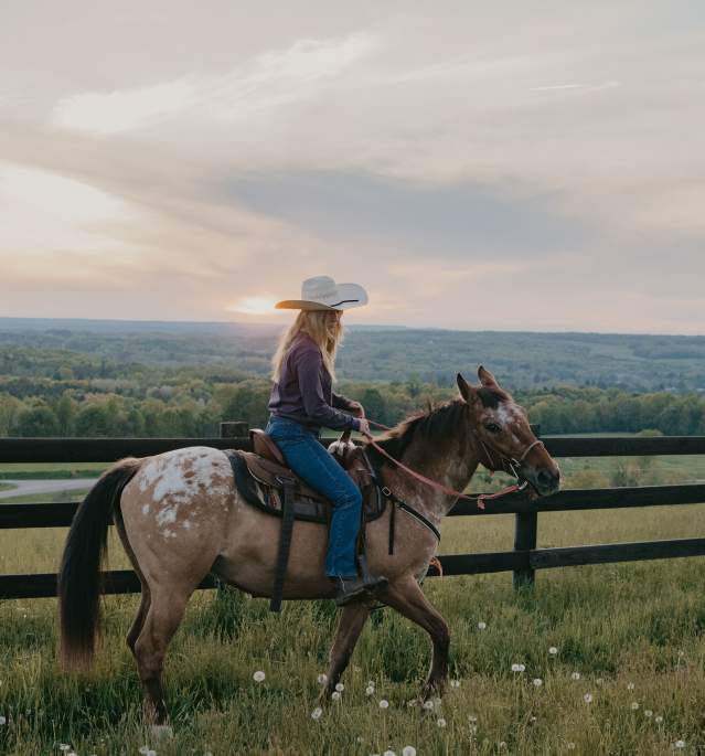 Woman Riding Horse Nunda Ranch