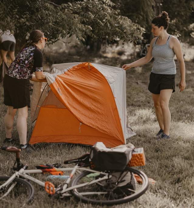 Women Setting Up Tent