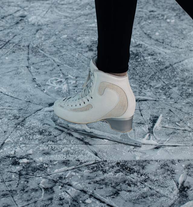 Close up of woman ice skating
