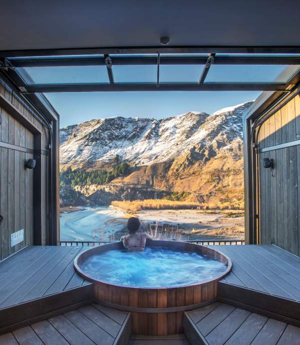 Woman relaxing in Onsen Hot Pools in Winter