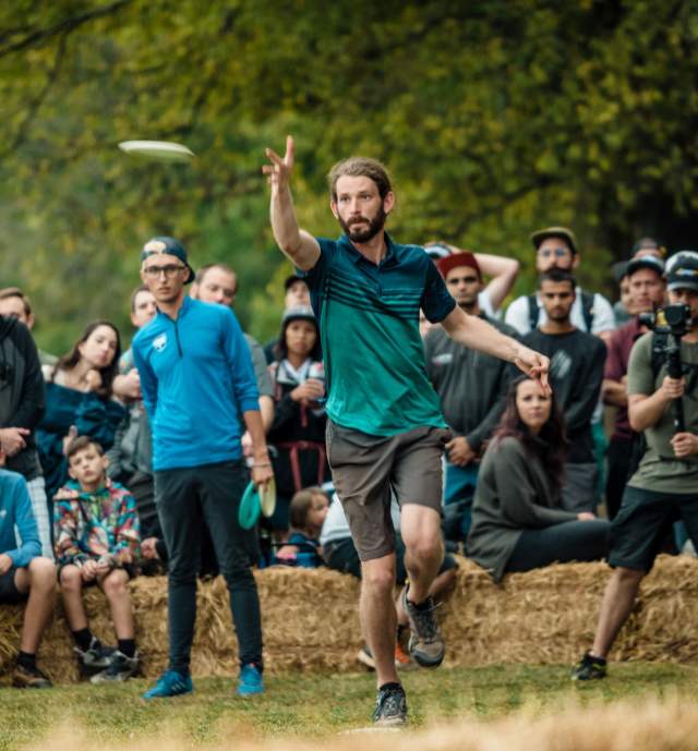 A man throwing a disc at Winthrop