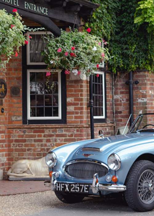 Classic car at Montagu Arms Hotel in the New Forest