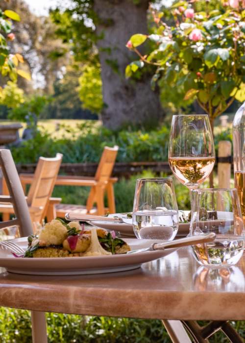 Al fresco dining on restaurant terrace at Chewton Glen Hotel in the New Forest