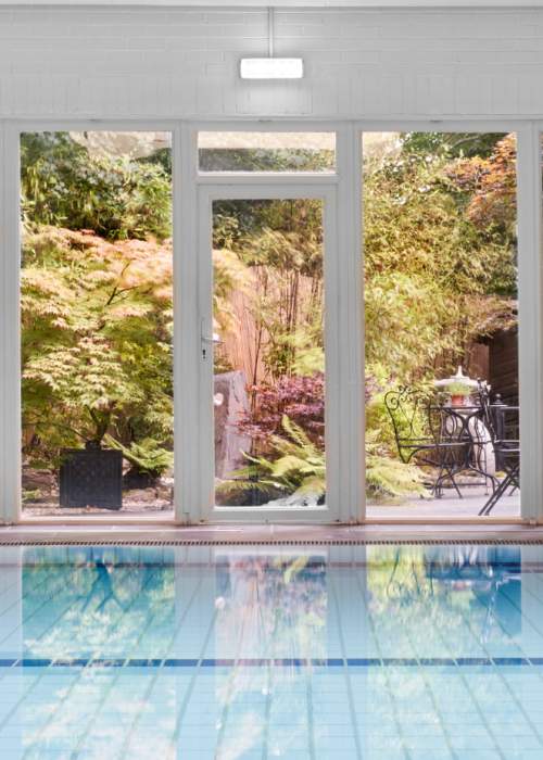 Look out into garden from spa at Careys Manor Hotel in the New Forest